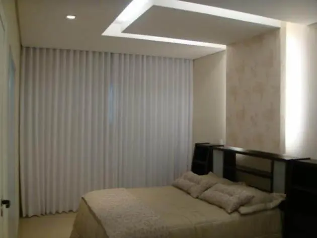 Projeto de gesso em Bertioga - varanda com forro decorativo